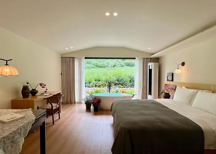 The Tea & Bamboo Retreat A Serene Homestay Offering Complimentary Bamboo Weaving Workshops And Tea Tasting Experiences.